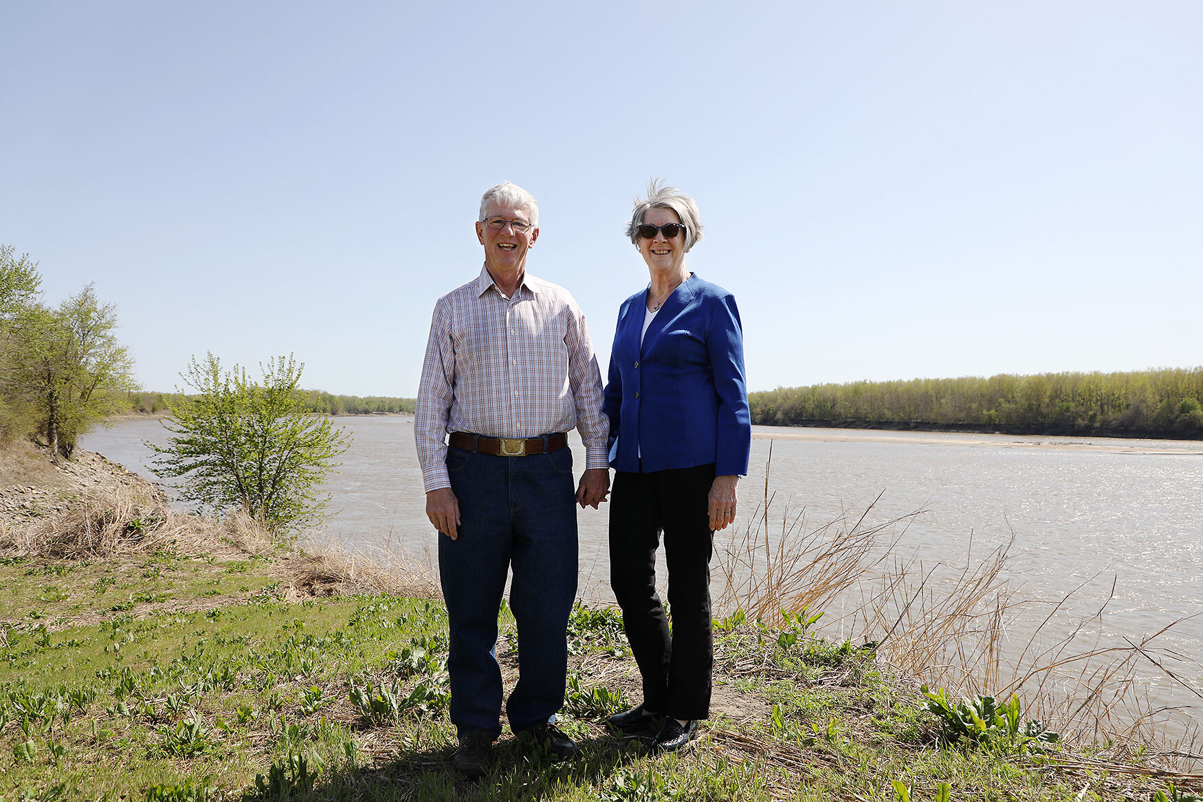 Larry and Brenda Potterfield stand for a portrait